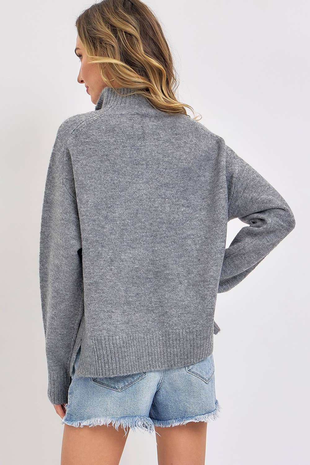 BUTTONED HIGH COLLAR SWEATER